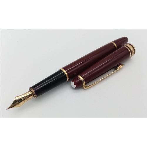 439 - A MONT BLANC MEISTERSTUCK CLASSIC BORDEAUX COLOUR FOUNTAIN PEN, WITH 14K YELLOW GOLD PEN NIB, IN GOO... 