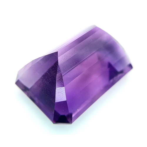 444 - A large (92.03 carats), octagonal step cut AMETHYST, with excellent vivid and uniform colouration an... 