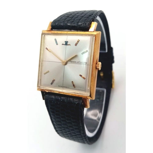 95 - A Vintage Jaeger Le Coultre Thin Mechanical Gents Watch. Black leather strap. 18K gold case - 27mm. ... 