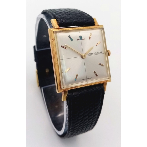 95 - A Vintage Jaeger Le Coultre Thin Mechanical Gents Watch. Black leather strap. 18K gold case - 27mm. ... 