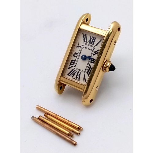 87 - A Vintage 18K Gold Cartier Mini Tank Ladies Watch Case. 18k gold case with 2443 and other Cartier ma... 