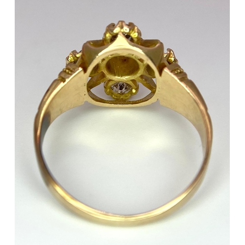 596 - A 9K Yellow Gold (tested) Diamond Ring. Five round cut diamonds on a raised setting. Size N. 4.32g t... 