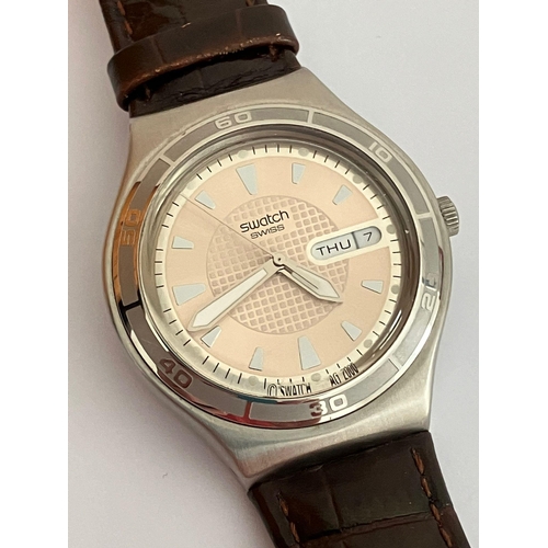 217 - Vintage SWATCH IRONY WRISTWATCH. Day/date model finished in stainless steel with genuine SWATCH leat... 