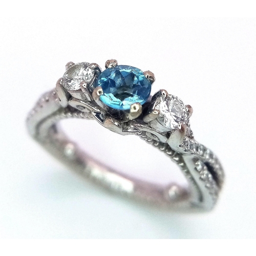 103 - A STUNNING 18K WHITE GOLD DIAMOND & TOPAZ TRILOGY RING, APPROX 0.40CT TOPAZ CENTRE AND 0.45CT DIAMON... 