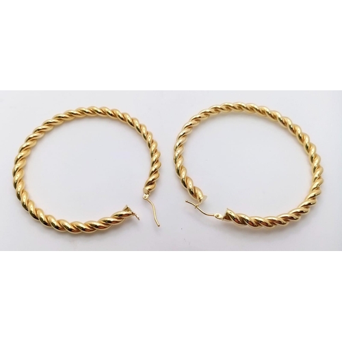 131 - A PAIR OF 9K YELLOW GOLD LARGE TWIST HOOP EARRINGS 6.1G