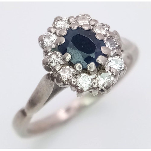 145 - A VINTAGE 18K WHITE GOLD DIAMOND & SAPPHIRE CLUSTER RING, WITH APPROX 0.40CT SAPPHIRE CENTRE AND 0.3... 