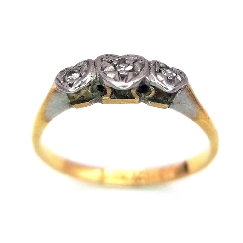 156 - AN ANTIQUE 18K GOLD 3 DIAMOND RING HAVING THE DIAMONDS SET IN HEART SHAPED PALLADIUM .   1.4gms   si... 