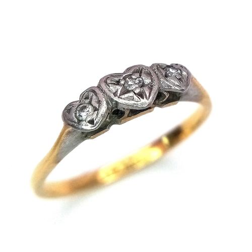 156 - AN ANTIQUE 18K GOLD 3 DIAMOND RING HAVING THE DIAMONDS SET IN HEART SHAPED PALLADIUM .   1.4gms   si... 