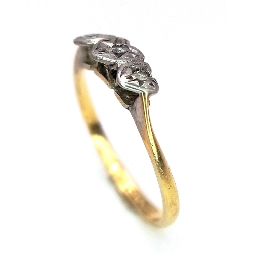 156 - AN ANTIQUE 18K GOLD 3 DIAMOND RING HAVING THE DIAMONDS SET IN HEART SHAPED PALLADIUM .   1.4gms   si... 