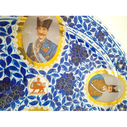 184 - A PERSIAN QAJAR LARGE SERVING PLATE WITH ROYAL CREST AND PICTURES OF THE ROYAL FAMILY .    41 X 30cm... 