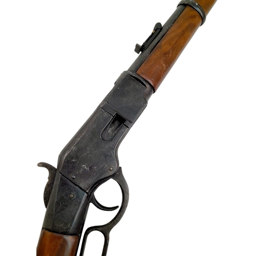 274 - An Inert Copy of a Winchester Lever Action Rifle. Full working action. Full Weight and Size, Metal a... 