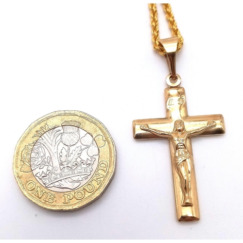 283 - A 9K GOLD CRUCIFIX ON A 9K GOLD 40cms TWIST ROPE CHAIN .   4.1gms