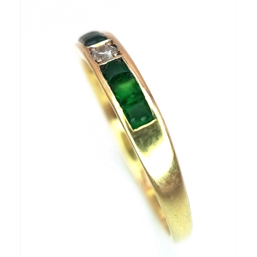 374 - An Excellent Condition 1990 Hallmarked 18 Carat Emerald and Diamond Modernist Design Ring. Set with ... 