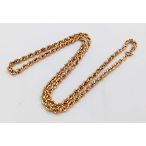 4 - A 9K GOLD ROPE TWIST NECK CHAIN .   6.2gms    50cms