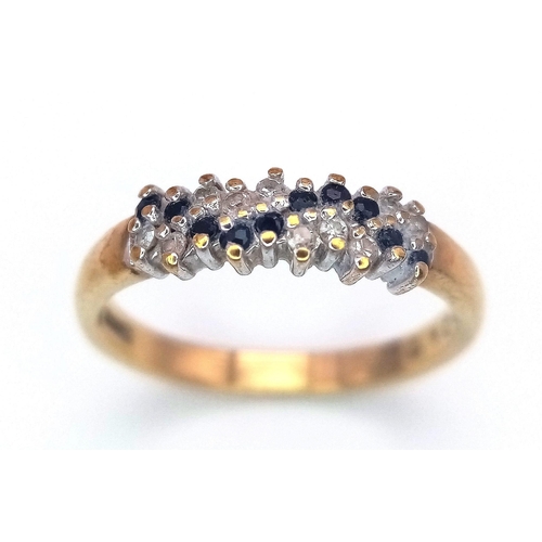 456 - A 9K GOLD RING WITH DIAMOND AND SAPPHIRE CLUSTER .   2.1gms   size M