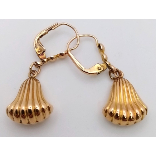 484 - A PAIR OF 9K GOLD SHELL SHAPED DANGLER EARRINGS .   2.1gms