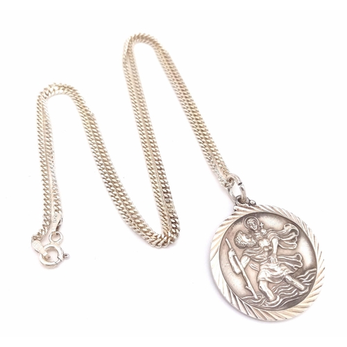 487 - A Silver Georg Jensen St. Christopher Pendant Necklace. Stamped on Obverse Side. 2.6cm Diameter on a... 