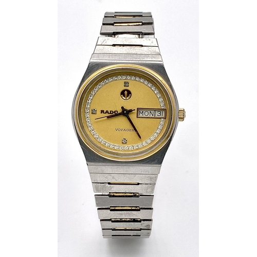 1319 - A Vintage Rado Voyager Automatic Unisex Watch. Stainless steel bracelet and case - 33mm. Gilded dial... 