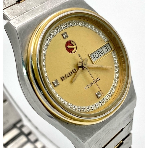 1319 - A Vintage Rado Voyager Automatic Unisex Watch. Stainless steel bracelet and case - 33mm. Gilded dial... 