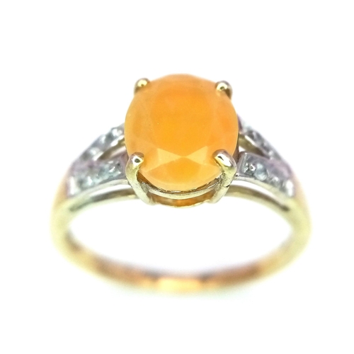 58 - A 9K GOLD AGATE AND DIAMOND RING .  1.8gms   size L