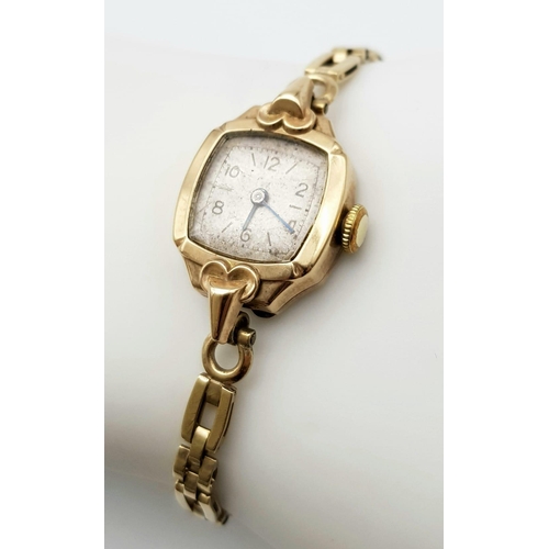 66 - An Antique 9K Gold Ladies Mechanical Watch. 9K gold bracelet and case - 17mm. White patinaed dial. W... 