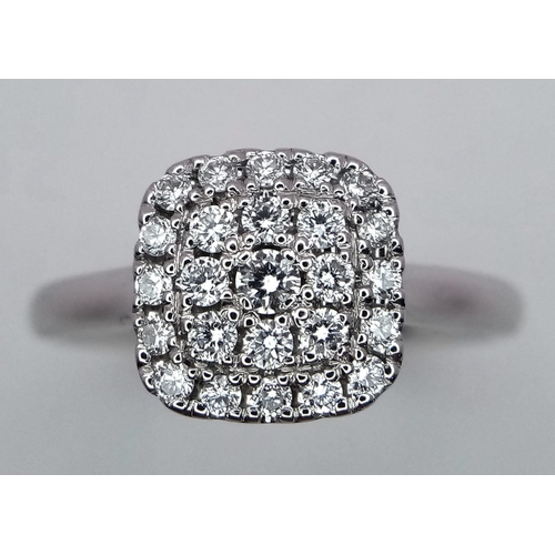 1312 - A 18K WHITE GOLD DIAMOND CLUSTER RING 0.35CT 3.9G SIZE L

RPM 4002