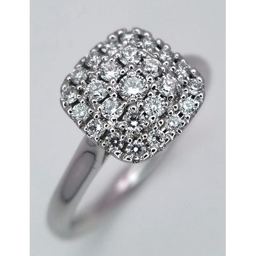 1312 - A 18K WHITE GOLD DIAMOND CLUSTER RING 0.35CT 3.9G SIZE L

RPM 4002