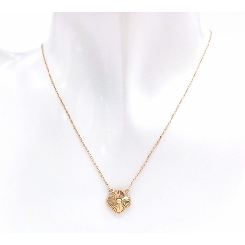 93 - An 18K Yellow Gold Lucky Clover Pendant on an 18K Yellow Gold Disappearing Necklace. 10mm - pendant.... 