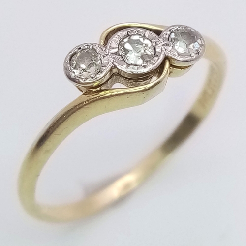 1182 - A VINTAGE 18K YELLOW GOLD & PLATINUM  TWIST RING SET WITH 3 OLD CUT  DIAMOND STONES, WEIGHT 2.2G SIZ... 