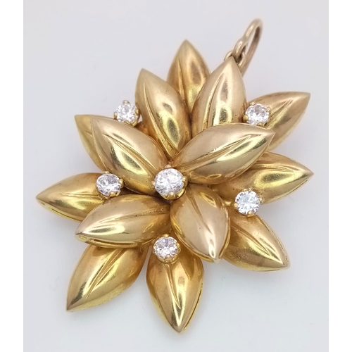 1195 - A 9K Yellow Gold (tested) and Diamond Decorative Floral Brooch. Six brilliant white zircons amongst ... 