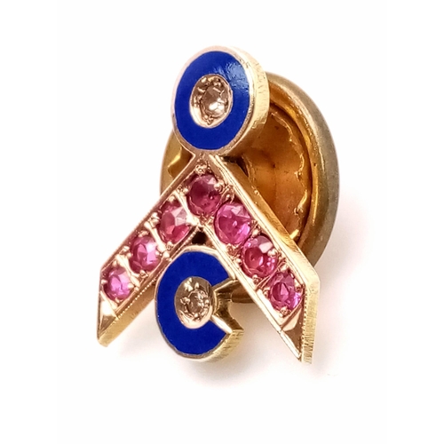 1110 - A Vintage ruby and diamond lapel pin with blue enamelling set in 10k gold. 15mm. 2.34g total weight.... 