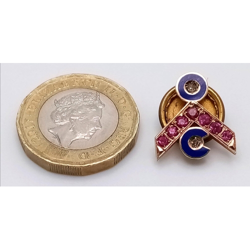 1110 - A Vintage ruby and diamond lapel pin with blue enamelling set in 10k gold. 15mm. 2.34g total weight.... 