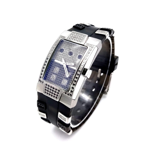 1186 - A TechnoMarine 1.25ctw White and Black Diamond Ladies Quartz Watch. Resin and diamond strap. Case - ... 