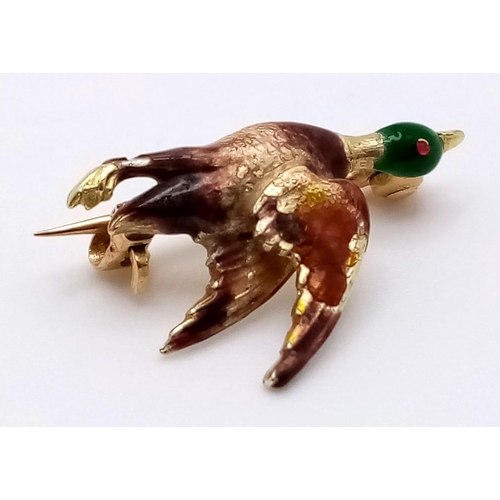 1180 - An Antique Detailed Enamelled Pheasant in Full Flight Brooch. Set in mid-karat gold (tested). 2cm. 1... 