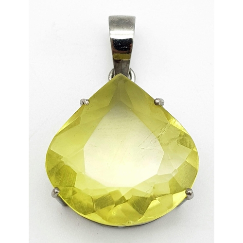 1164 - A Lemon Quartz Teardrop Pendant set in 925 Sterling silver. 30.9ct. 11.20g. 4cm. Comes with a presen... 