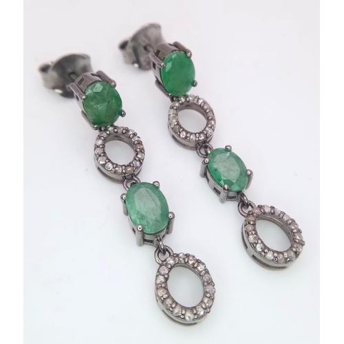 1156 - A Pair of Zambian Emerald & Diamond Silver Drop Earrings. Emerald -2.68ctw. Diamond- 0.60ctw. 4cm dr... 