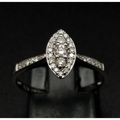 1131 - A 9K WHITE GOLD MARQUISE SHAPED DIAMOND CLUSTER RING. 0.20CT DIAMONDS. TOTAL WEIGHT 1.6 GRAMS. RING ... 