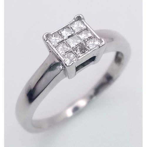 1100 - An 18K White Gold (tested) Diamond Ring. 0.30ct. Size M. 3g total weight.