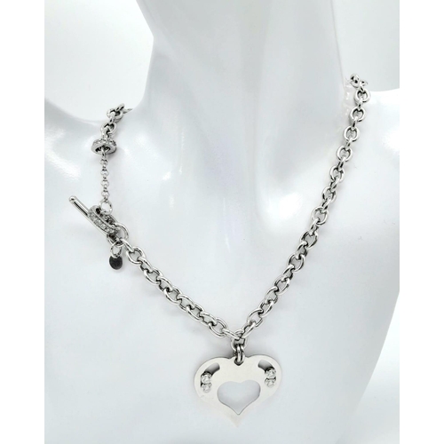 1051 - A Sterling Silver Heart Pendant on a Silver Chain. 3cm pendant. 46cm chain. 22g total weight.