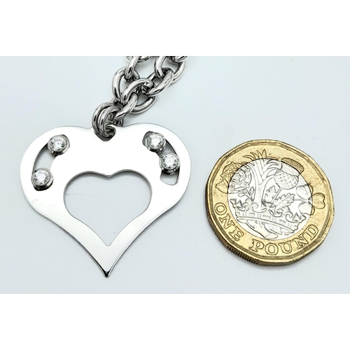 1051 - A Sterling Silver Heart Pendant on a Silver Chain. 3cm pendant. 46cm chain. 22g total weight.