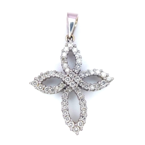 1045 - An 18K White Gold Diamond Encrusted Floral Pendant. 3cm.
2.3g total weight. 0.51ctw diamonds.