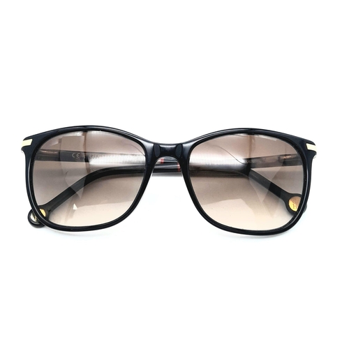 1075 - A Pair of Designer Carolina Herrera Sunglasses. Good condition.