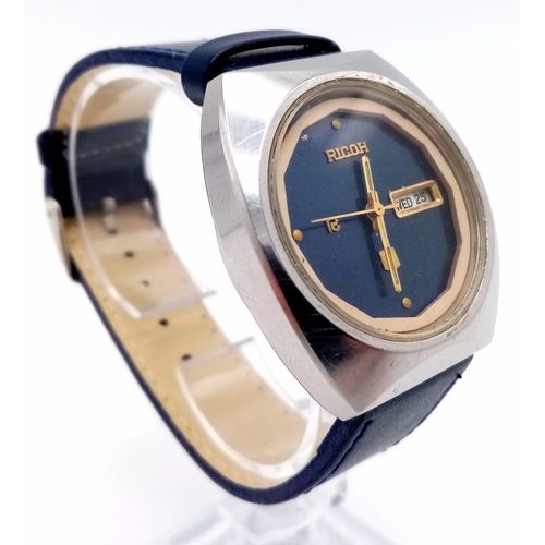 1060 - A Vintage Ricoh Automatic Gents Watch. Blue leather strap. Stainless steel case - 37mm. Blue dial wi... 