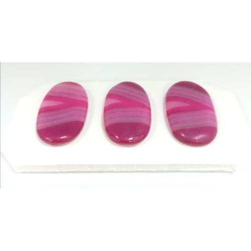 1046 - A very special group of three banded red agate cabochons (28 x 17 mm) perfect for jewellery making.