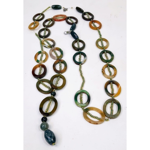 1040 - A Unique Rope Length Oval Multi-Coloured Agate Necklace.
130cm. Ref: T1R