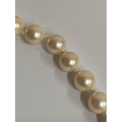 1017 - Vintage  JKA PEARL NECKLACE with SILVER CLASP. Attractive Single row of individually knotted evenly ... 