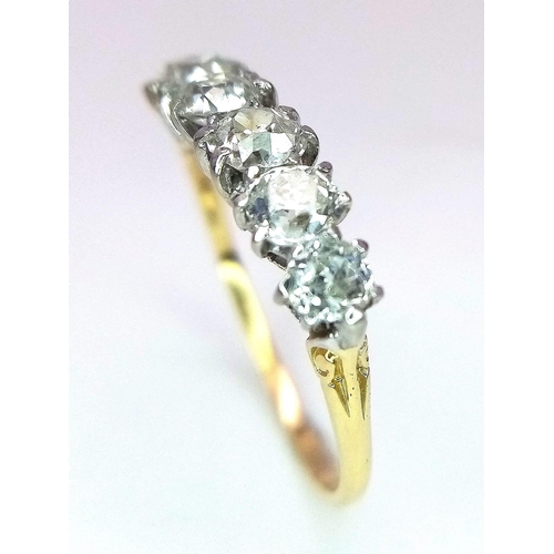 16 - A Stunning 18K Gold (tested) Six Stone Diamond Ring. 1.5ctw of brilliant round cut diamonds. Size P/... 