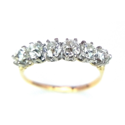 16 - A Stunning 18K Gold (tested) Six Stone Diamond Ring. 1.5ctw of brilliant round cut diamonds. Size P/... 