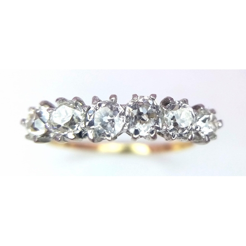 16 - A Stunning 18K Gold (tested) Six Stone Diamond Ring. 1.5ctw of brilliant round cut diamonds. Size P/... 