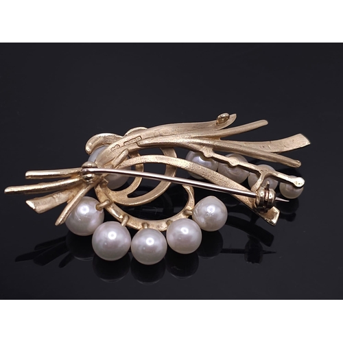 2 - A 9k Yellow Gold and Pearl Decorative Floral Brooch. 5cm. 8g weight